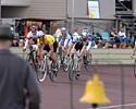 (Click for larger image) Riders in the Invitation Sprint Derby head towards the bell lap