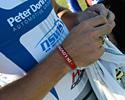 (Click for larger image) The red wrist bands in memory of Amy Gillett are worn by many riders at the Tasmanian Christmas Carnivals.