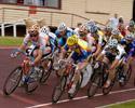 (Click for larger image) They bunch up  on the home turn in the final of the Latrobe Wheelrace.