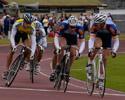 (Click for larger image) Riders in the final  of the Keirin jostle for position with a lap to go.