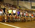 (Click for larger image) Riders in the Madison line up  before the start of the 175 lap event.