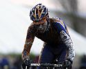 (Click for larger image) Sven Vanthourenhout (Rabobank) en route to a muddy victory
