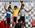 (Click for larger image) Stage 1 podium (L to R): Kam Po Wong (2nd), Kin San Wu (1st), and Gang Xu (3rd)