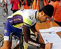 (Click for larger image) Masahiko Mifune (CMS Cycling Team) signs on