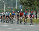 (Click for larger image) The peloton is single file