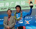 (Click for larger image) Kam Po Wong wearing the Blue Leader's Jersey for best Asian rider