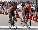 (Click for larger image) Kam Po Wong wins his fourth straight stage with a bike throw over Joe Papp who has finished second three times.