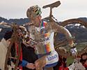 (Click for larger image) Sven Nys (Rabobank) doing what he does best, running through the mud with a bike on his shoulder. Funny way to make a living...