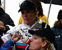 (Click for larger image) Kupfernagel (Ger) covers the women's winner Van Den Brande (Van Bemmelem) with her umbrella 