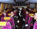 (Click for larger image) Back in the bus on the way to the hotel, everyone is very happy
