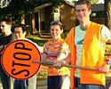 (Click for larger image) Michael Rogers (2nd from left) helps out with marshaling at a Canberra Wednesday night criterium. Said retired pro and Canberra resident, Stephen Hodge: “Mick came out to have a look at one of our weekly Wednesday night criteriums in Canberra, and as is always the case, the corner marshalling duties get shared around on the night. So he volunteered to man one of the corners for a while, doing his bit again while he's at home. It was the 7th December. He was able to watch his two brothers in the B grade race at the same time (Peter & Deane).” The female rider in the background is former AIS rider Alison Wright.