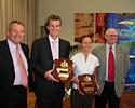 (Click for larger image) Michael Rogers and Oenone Wood (center) with the keys to the city of Canberra. Also pictured are Ted Quinlan MLA, ACT deputy chief minister and treasurer, minister for sport and recreation; and Ken Norris, general manager of the ACT Academy of Sport.