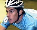 (Click for larger image) Franco Marvulli looks up at the scoreboard as he cruises round the track at speed. Six day riders need to be able to do sums in their head whilst riding flat out in a bunch on the track