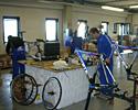 (Click for larger image) Mechanics Beppe Archetti and Enrico Pengo hard at work prepping Lampre's fleet of Wilier Triestina bikes for 2006.