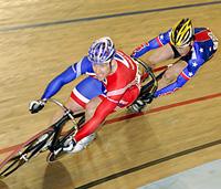 (Click for larger image) Jamie Staff (UK) leads out the sprint in the 1/8 final that would result in him on the deck and disqualified, and his opponent Michael Blatchford (USA) moving on to the next round