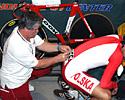 (Click for larger image) A Polish team rider gets some help