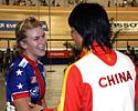 (Click for larger image) Sarah Hammer  gets congratulations from a Chinese rider