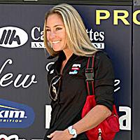 (Click for larger image) Rochelle outside the motorhome during the team presentation