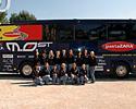 (Click for larger image) A team and their bus... the SAFI team pose for official photos