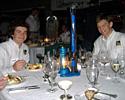 (Click for larger image) Jared Faciszewski and Zach Taylor look at the unusually appropriate centerpieces for exquisite dining