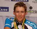 (Click for larger image) Wes Sulzberger (Cyclingnews.com)  from Tasmania, proudly displays his silverware on the podium after his second place in the men's road race.