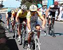 (Click for larger image) Robbie McEwen leads the chase group at the bell