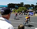 (Click for larger image) Chris Jongewaard (McKnight's Retravision/Fisher Paykel) leads a group around the circuit in Portarlington where many holidaymakers took advantage to see the race