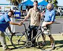 (Click for larger image) John Trevorrow (l) and Phil Liggett fool around with a pretty Baum bike