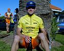 (Click for larger image) Evan Oliphant (Team UNO) enjoys the sun in Victoria with his leader's jersey