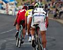 (Click for larger image) Robbie McEwen sits comfortably on the back of a leading group