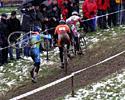 (Click for larger image) A group of three riders is trying to get up the muddy hill