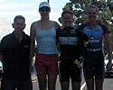 (Click for larger image) The women's place getters (l-r): Helen Kelly (VIS), Emma Rickards (Univega) and Peta Mullens (VIS) pose with Bob Kelly of race sponsor Tri-Alliance