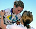 (Click for larger image) Anna Meares presents sister Kerrie with the gold medal