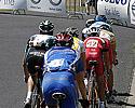 (Click for larger image) Chasing riders descend towards Port Phillip Bay  and into the home straight