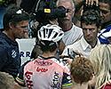 (Click for larger image) Fans and media  flock around Robbie McEwen to listen to the World's fasted man on a bike speak about his win in Geelong