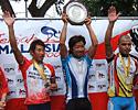 (Click for larger image) Top three after day one. (L-R) Kai Tsun Lam, winner Makoto Iijima and Mehdi Sorahbi. 